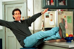 Jerry Seinfeld poses on the set of "Seinfeld."