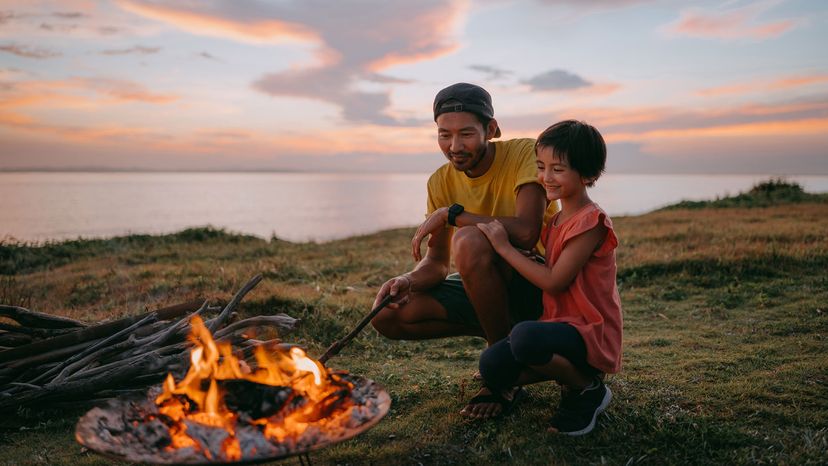 Japanese family at campfire