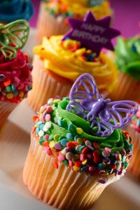 Simply decorated homemade cupcakes look just as festive as an expensive cake from a professional bakery.