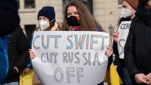 Women protest outdoors for city life equality.