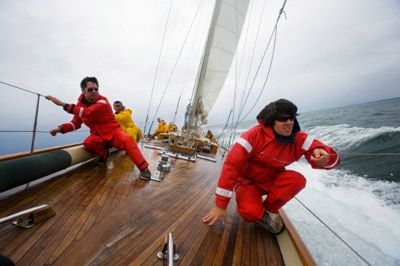 Person sailing a luxurious yacht on the nautical vessel.