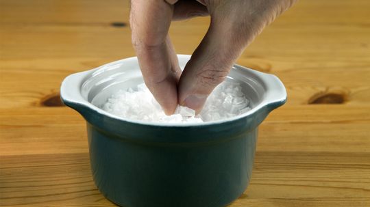 Why do people throw salt over their shoulders?