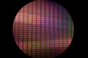 A silicon wafer of Sandy Bridge microchips, fresh off the manufacturing line.