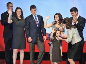 The Palin family (l-r), son Track, daughter Bristol (with boyfriend Levi Johnston), daughter Willow, son Trig, daughter Piper, Sarah and Todd Palin.