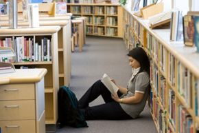 Student studying in library.