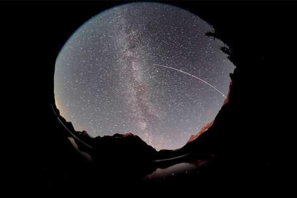 Night sky filled with galaxies and the Milky Way.