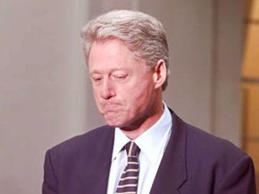 President Bill Clinton considers his words during a 1996 press conference about the Whitewater Savings &amp; Loan scandal.