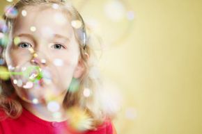 Girl Blowing Bubbles