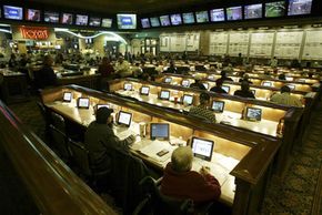 Enthusiasts gather in the sports book inside the Green Valley Ranch Resort and Spa in Las Vegas on Jan. 15, 2005. Sports books see an enormous rise in traffic during March Madness.