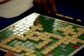 Scrabble is a word game that relies on both vocabulary knowledge and chance.
