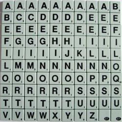 A full 100-tile set from an English-language Scrabble game.