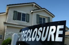 Foreclosure sign in front of home in Stockton, Calif. 