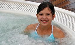 Determine whether you want a hot tub for two, or one to accommodate you, your husband and your four kids.