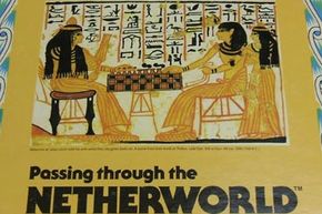 A close-up of a game box with an illustration of an ancient Egyptian wall painting.