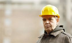 Older man in hard hat