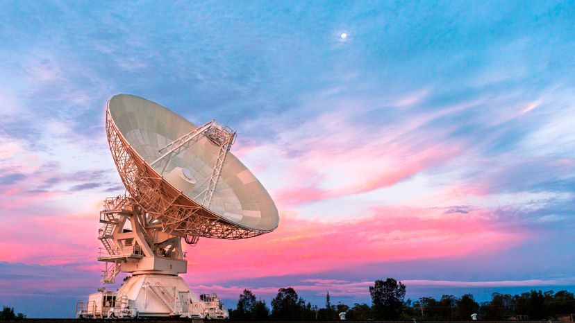 Narrabri Radio Telescope at Dusk with blue and pink sky with clouds