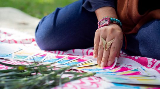 The Profound Insights of the Seven of Pentacles: A Tarot Journey