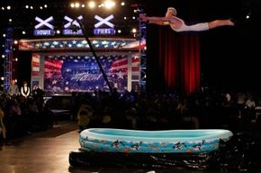 Darren Taylor, who goes by the stage name "Professor Splash," performs an extreme shallow high dive while auditioning for “America’s Got Talent” in 2011.