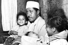The deposed Sultan of Zanzibar hangs out with three of his kids as they travel from Manchester to London.