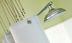 You don't need to toss that moldy shower curtain. Clean it and keep grime at bay with these tips.