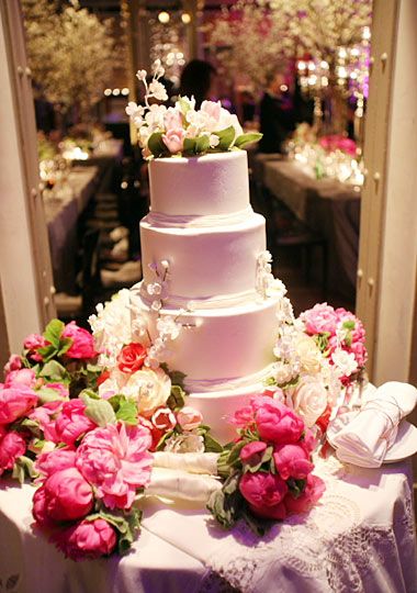 white bouquet accented with peony bouquets