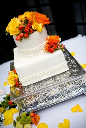 autumn wedding cake on silver stand
