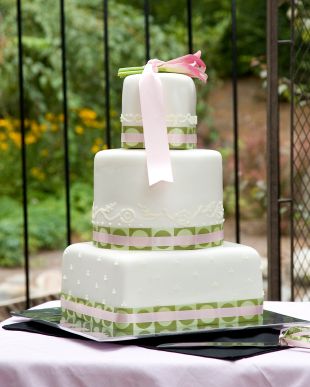 square and round wedding cake in pink and green