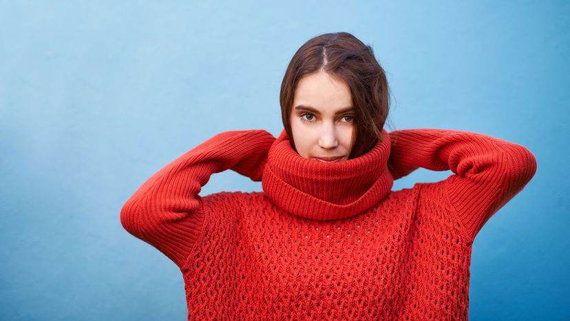 girl in oversized red sweater