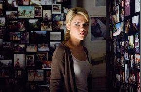 Jane (Rachael Taylor) is troubled by a room of disturbing spirit photography imagery.