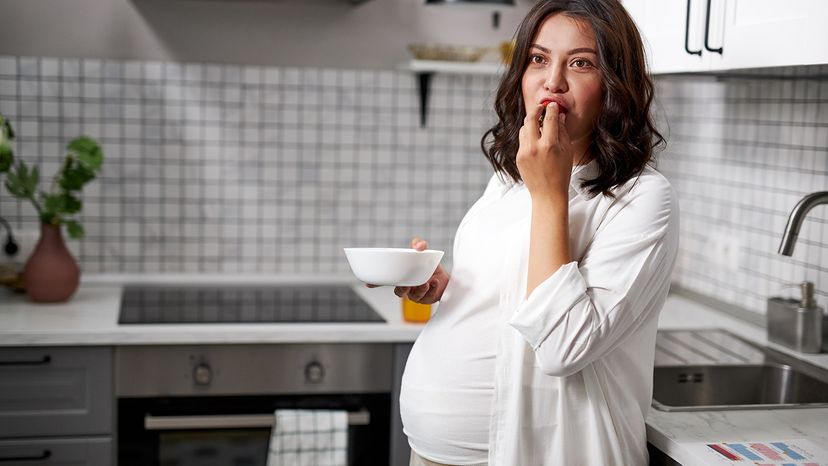 Pregnant woman eating