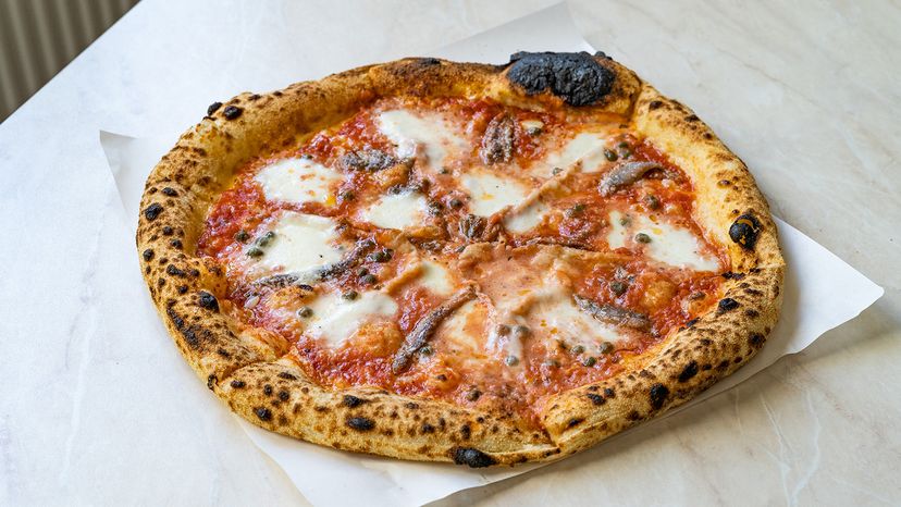 Traditional classic Neapolitan anchovy pizza