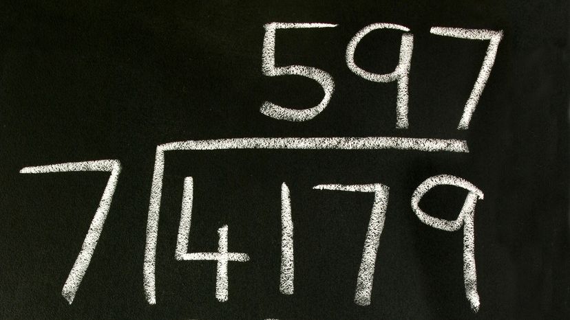 A long division problem on a blackboard