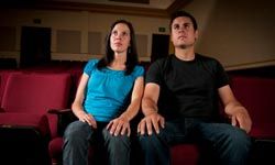 Man and woman in movie theater