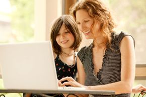 Mother and daughter at computer