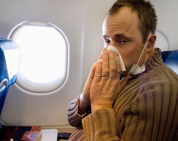sick person on plane