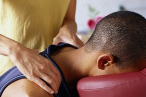 person getting a shoulder massage