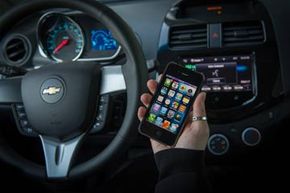 Chevrolet Spark and Chevy Sonic LTZ and RS models will integrate Apple's voice-activated Siri software into their Chevy MyLink systems. Other carmakers are bringing Siri to their autos too.