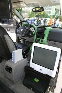 Truck equipped with front seat television screens.