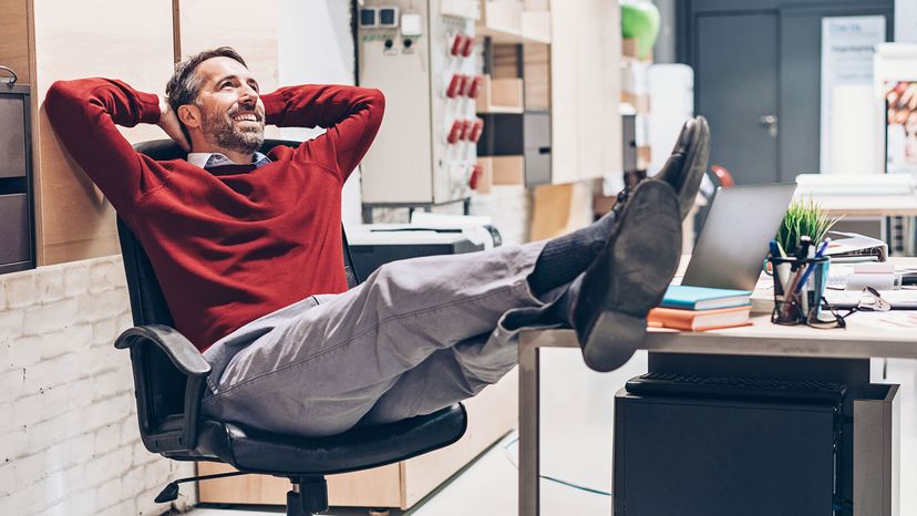 man relaxing in chair