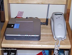 The author used a Linksys WRTP54G wireless router for Vonage service.