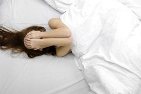 Woman struggling to sleep