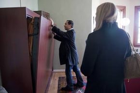 Rep.-elect Joaquin Castro, D-Texas, checks out a Murphy bed while apartment hunting on Capitol Hill.“width=