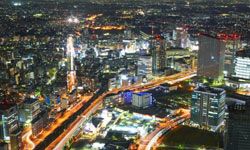 Photograph of a nighttime cityscape.&nbsp;