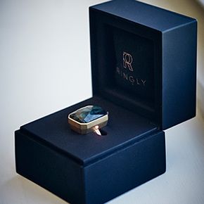 The Ringly's ring box doubles as a charger for the smart ring when plugged into a USB outlet.