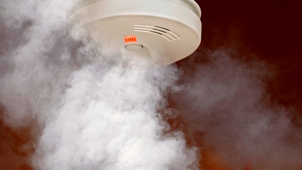 Smoke Detector on Ceiling with Smoke Below