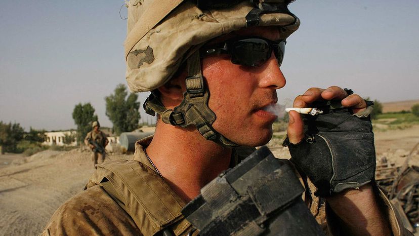 U.S. soldier smokes a cigarette