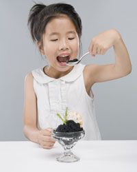 little girl eating caviar