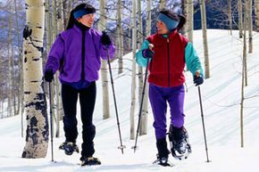 two women snowshoeing