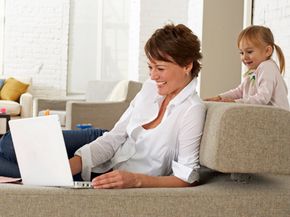 Mom, daughter and laptop