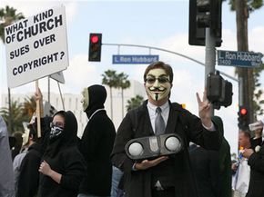 Groups like Anonymous use social networking sites to organize real world protests like this one against the Church of Scientology.